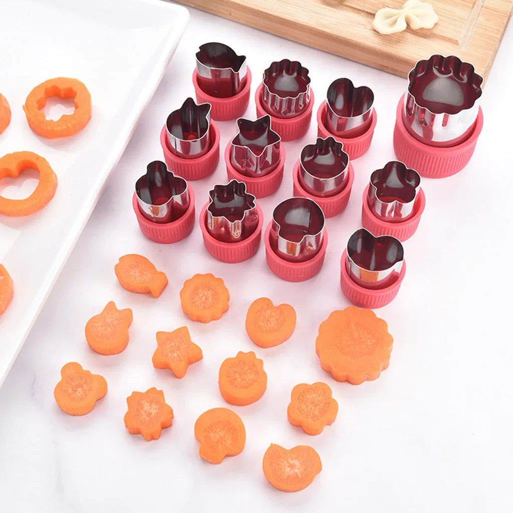 Mini shape cutters with carrot flowers on a wooden board