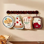 Hanging kitchen hand towel on a cupboard handle