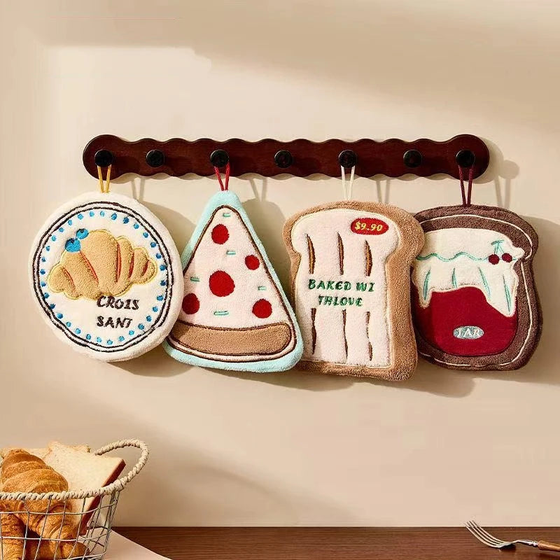 Hanging kitchen hand towel on a cupboard handle