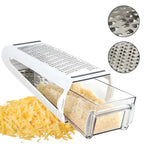 Box grater with clear container and grated cheese