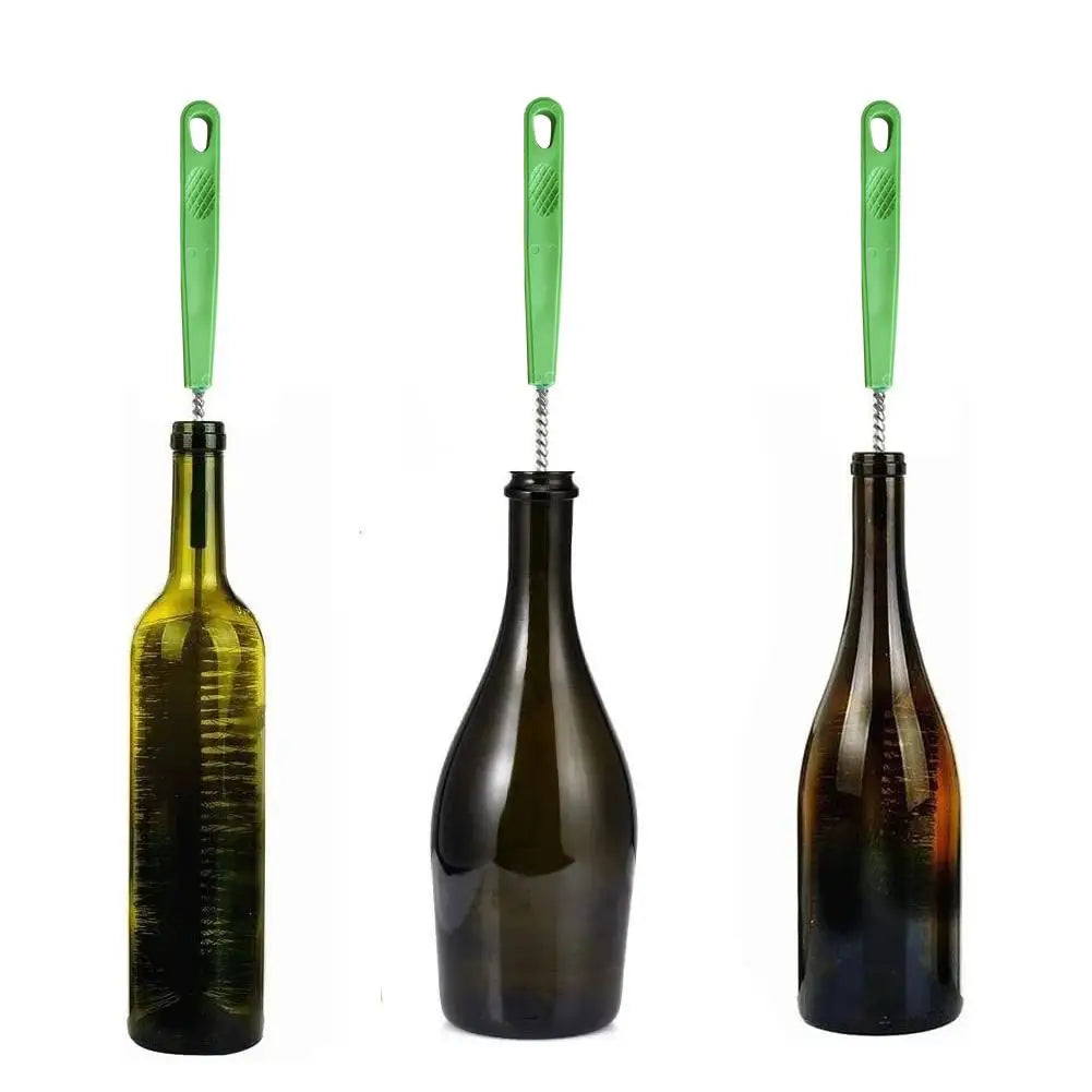 Cleaning a bottle at the sink with a long-handled brush
