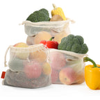 Cotton mesh produce bags filled with fruit and vegetables