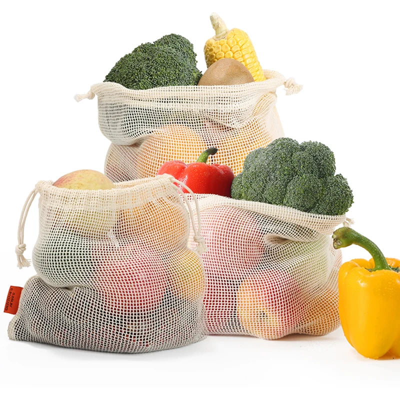 Cotton mesh produce bags filled with fruit and vegetables