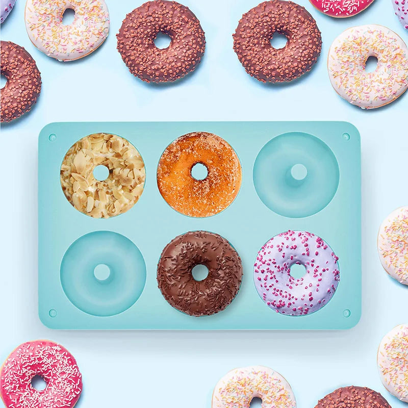 Silicone doughnut mould with six baked doughnuts