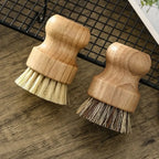 Two wooden pot scrubbing brushes with natural bristles