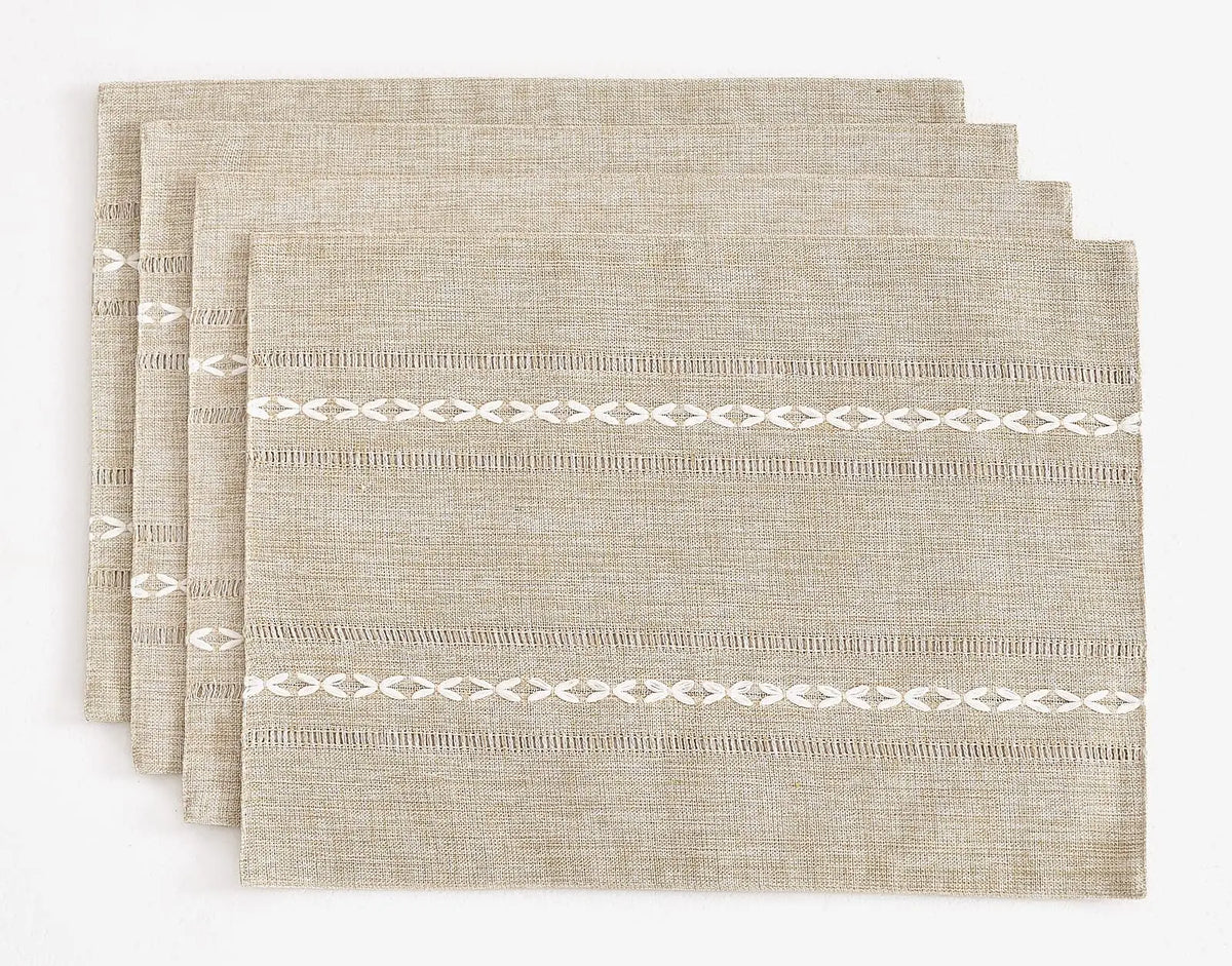Hemstitched cotton linen placemats on a table