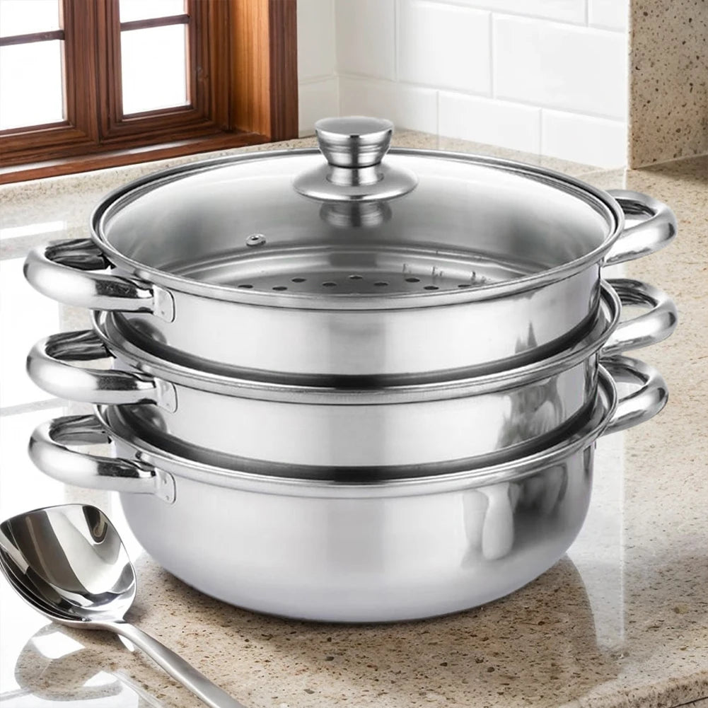 Three-tier stainless steel steamer pot on a worktop