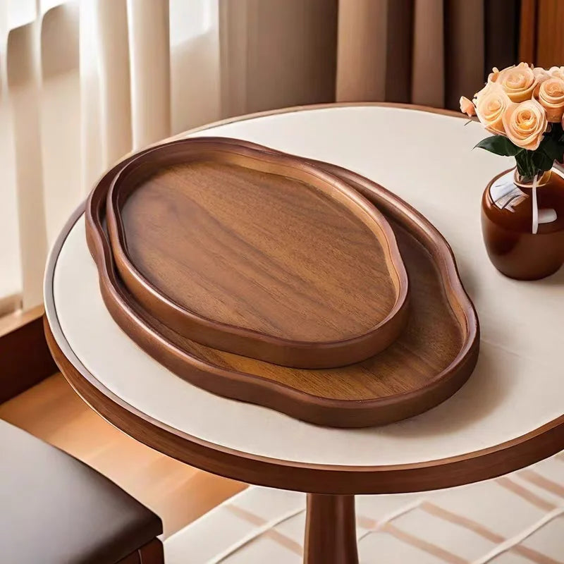 Rectangular wooden serving tray on a coffee table