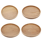 Round wooden serving tray with fruit