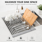 Roll-up drying rack across a kitchen sink holding dishes