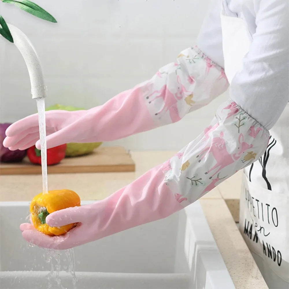 Washing a pepper wearing pink long-sleeve dishwashing gloves