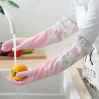 Washing a pepper wearing pink long-sleeve dishwashing gloves