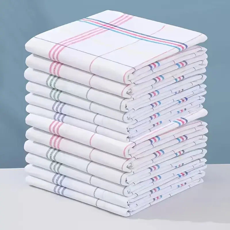 Stack of striped cotton kitchen towels in mixed colours