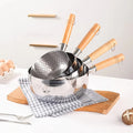 Hammered stainless steel milk pans with wooden handles