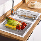 Over-sink colander holding vegetables across a sink