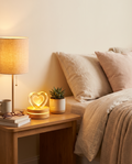 Stellora crystal night light styled on a bedroom nightstand