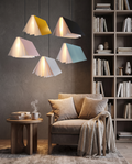 Flying Book pendant light styled above a reading nook