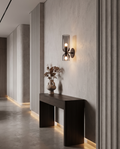 Nordic smoked glass wall lamp styled in a luxury hallway