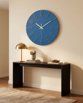 Noble modern wall clock styled above a console table