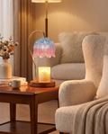 Retro candle warmer lamp styled beside an armchair