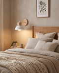 Wood and metal wall lamp styled in a bedroom