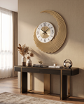 3D metal wall clock styled above a modern console table