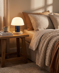 Mushroom rechargeable LED table lamp styled on a nightstand
