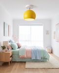 Nordic macaron ceiling light styled in a bright bedroom