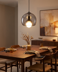Clyde handblown glass pendant light styled above a dining table