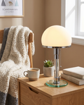 Wilhelm Bauhaus glass table lamp styled on a nightstand