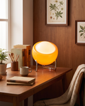 Bauhaus retro glass table lamp styled on a study desk