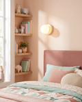 Macaron colored glass LED wall lamp styled in a playful bedroom