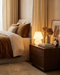 Murano-style glass mushroom lamp styled on a nightstand
