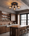 Industrial adjustable black spotlight ceiling light styled in an industrial kitchen