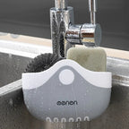 Sink caddy holding a sponge and scrubber