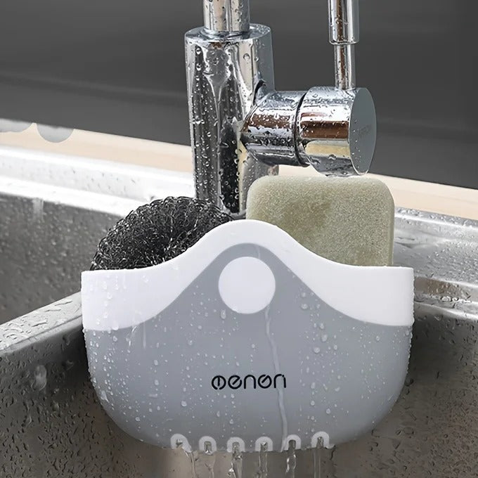 Sink caddy holding a sponge and scrubber